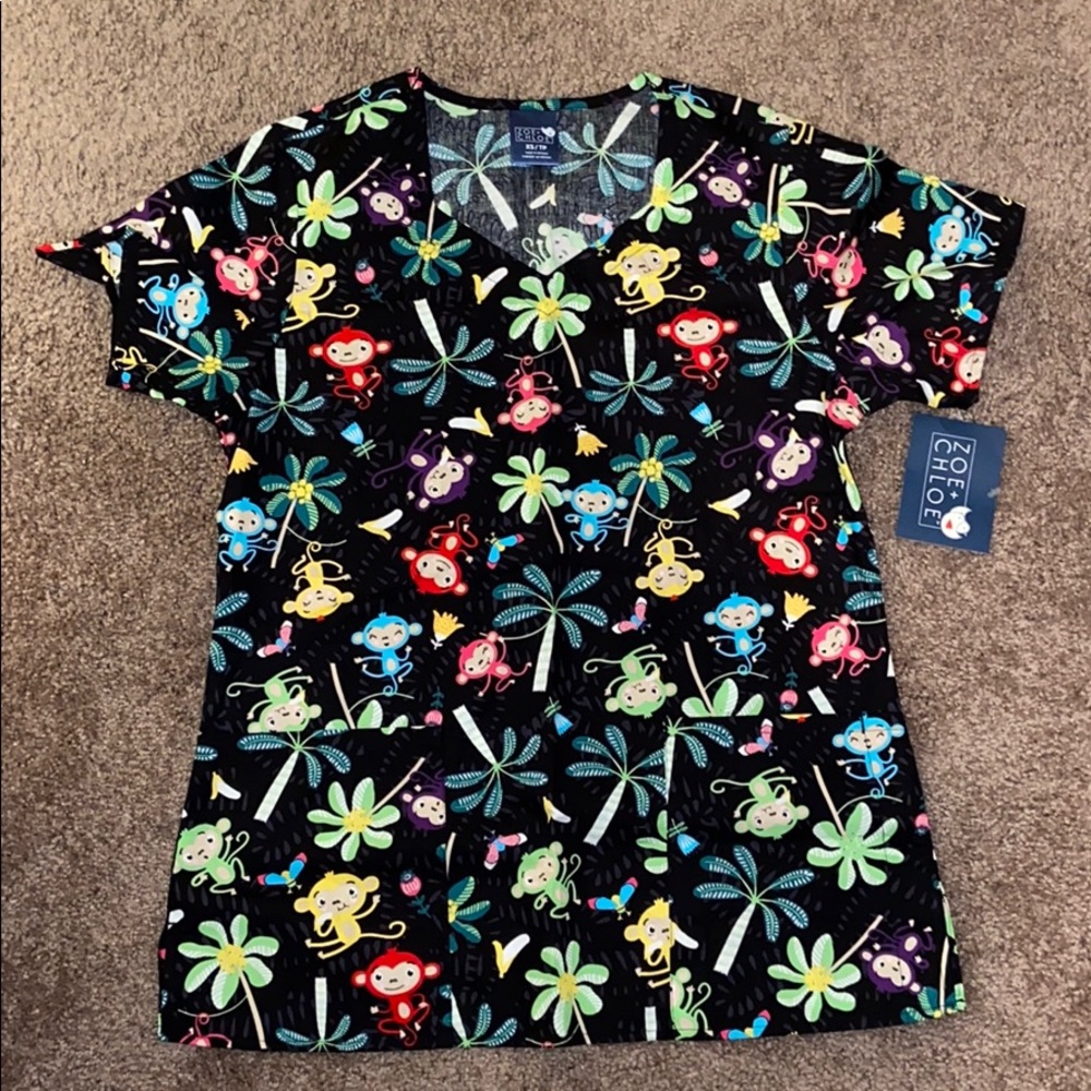 Never worn scrub top!
